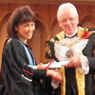 The Lord Mayor of London gives Noriko her certificate
